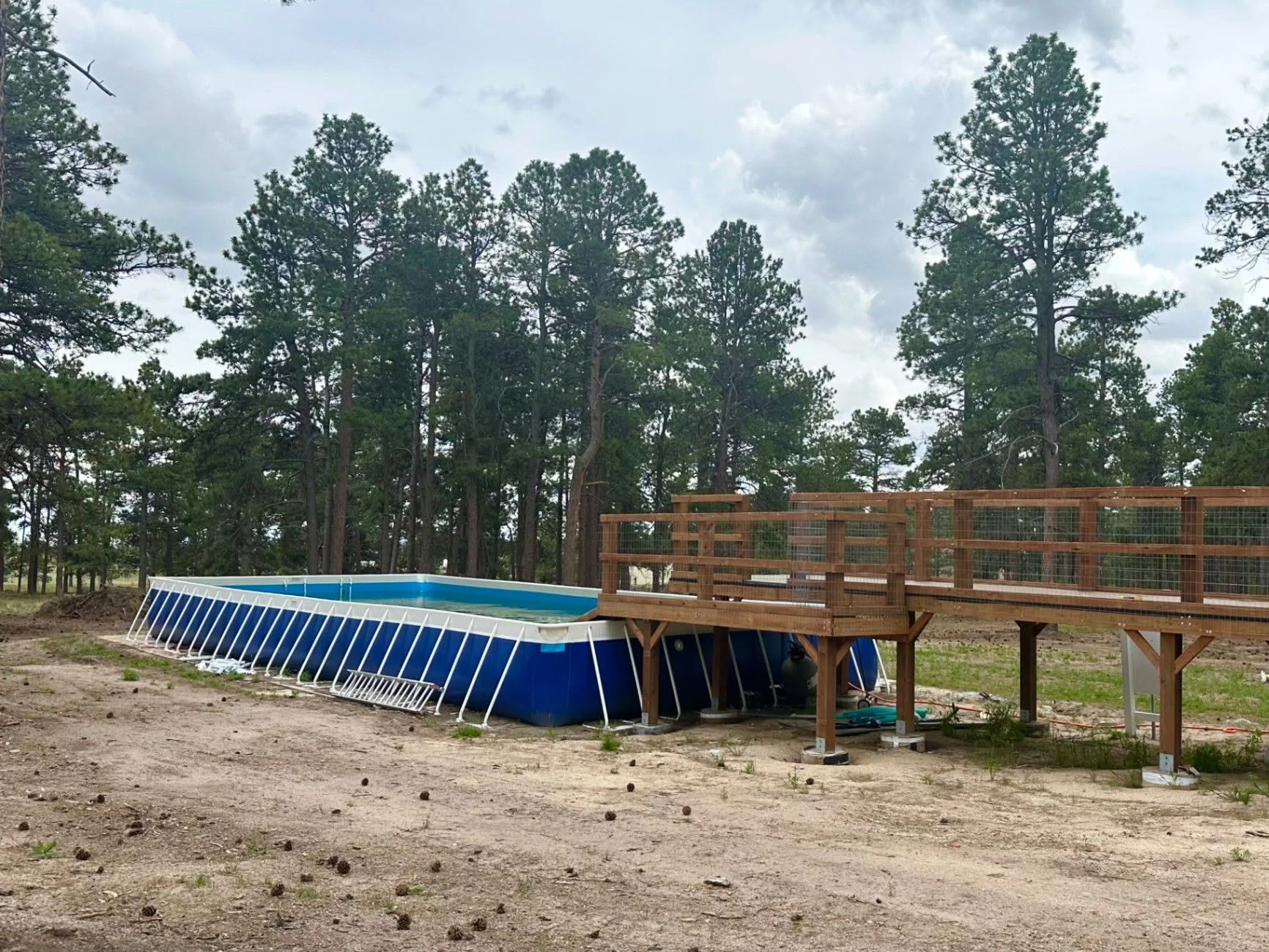 Pool and fenced outdoor activity area at Pinnacle K9